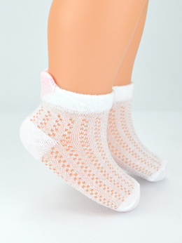 White jacquard baby socks with a pink heart