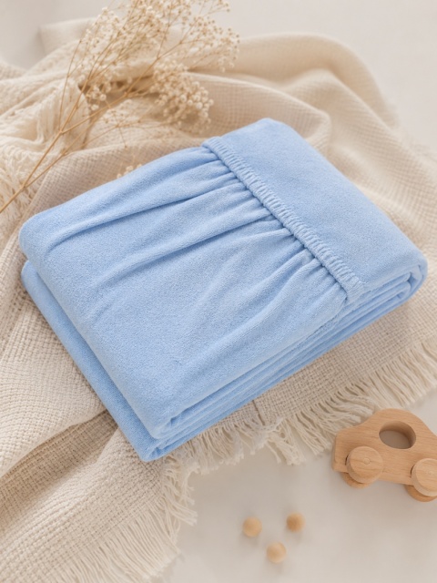 Prześcieradło frotte z gumką na łóżeczko 140×70 cm – błękitne